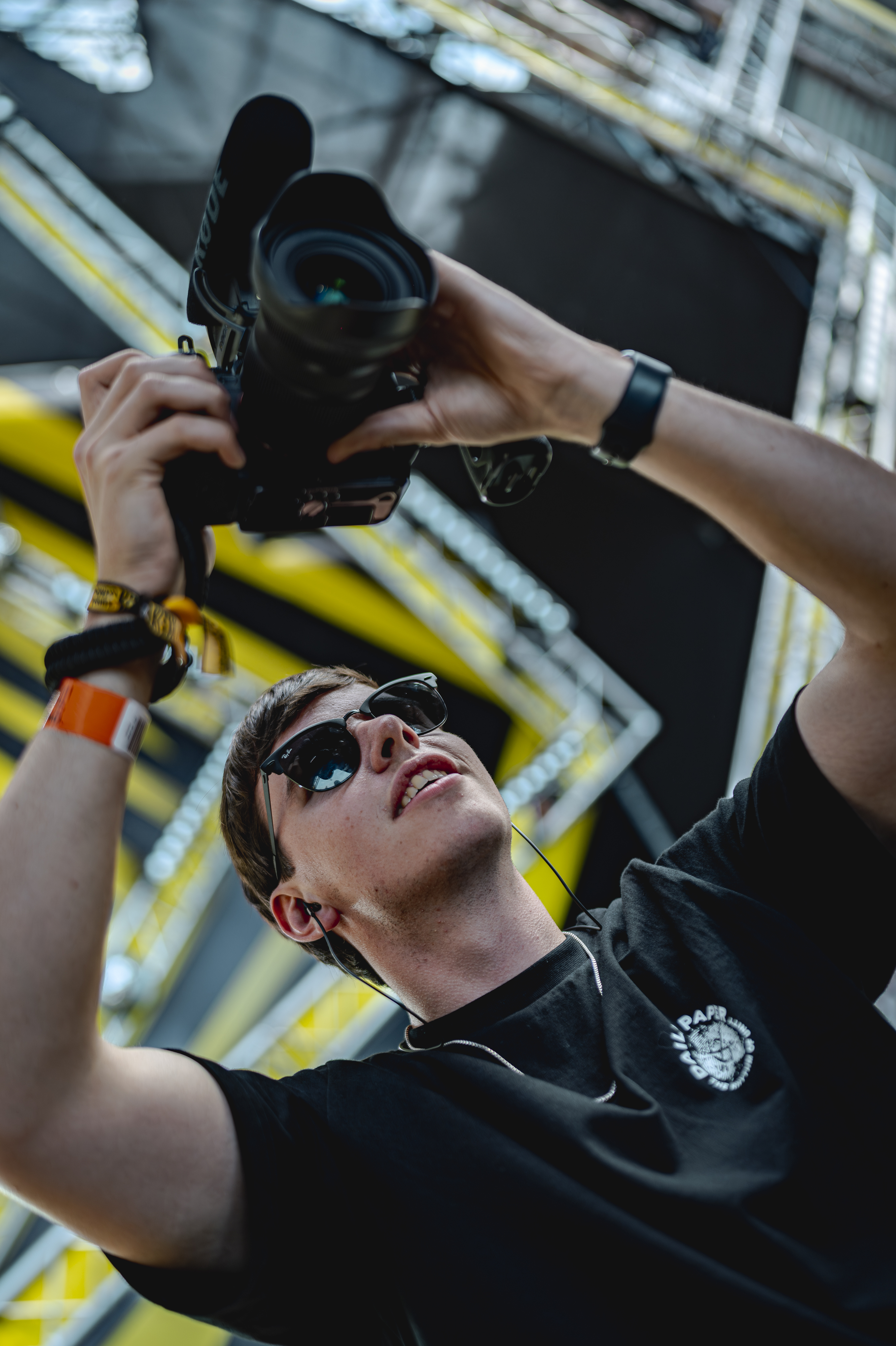 Ryan van der Niet filming at a festival